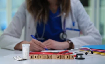 97406892_healthcare-professional-writing-on-the-importance-of-folic-acid-for-health-and-wellbeing-728x445